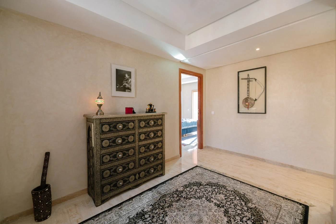 Art display on the upstairs landing with Moroccan decorative pieces