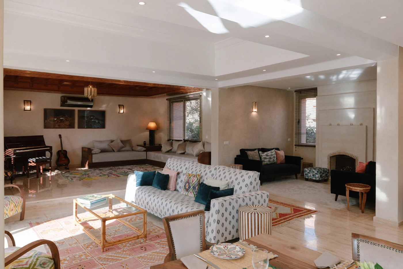 Spacious salon with piano and seating